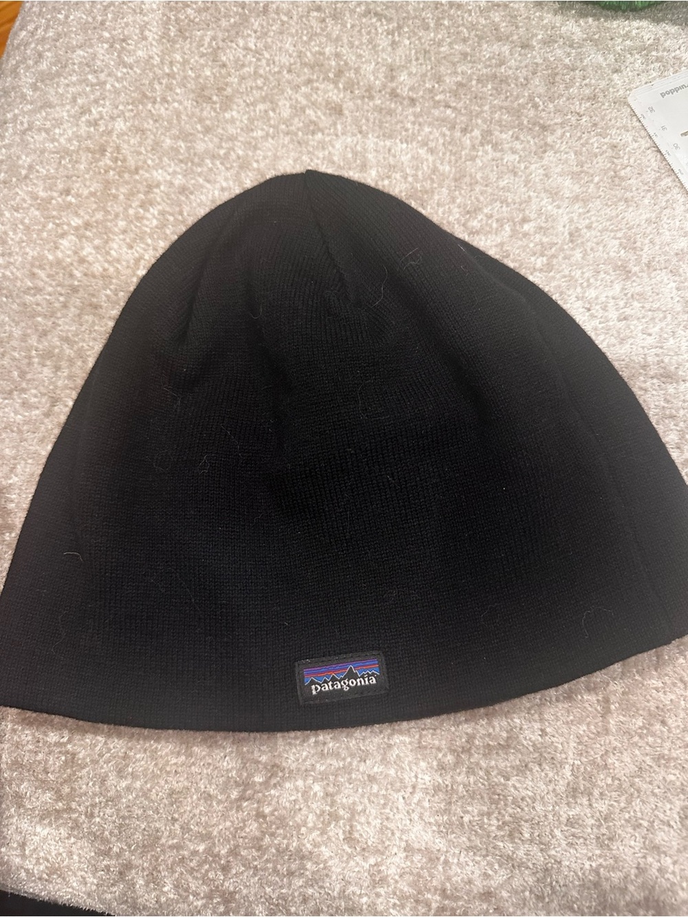 Patagonia with NYSE Branded Black Knit Beanie with Small Logo Patch